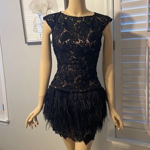 THE MOST FUN! Like-new lace and feather cocktail mini dress w/open back